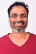 © Ranta Images - Portrait of happy mature handsome bearded Indian man