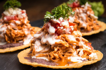 Wall Mural - Hard shell Nachos with pulled pork and sauce