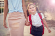 © Aleksej - Back to school. Parent care concept. Mother escorting pupil to school.