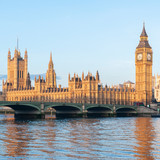 Fototapeta Big Ben - London - The Houses of Parliament and the Big Ben tower in Westminster seen from the Queen's Walk riverfront at dawn. River Thames.  United Kingdom, UK. Squared format ideal for social medias