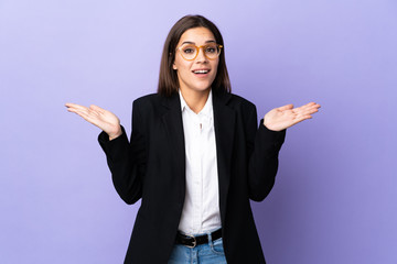 Sticker - Business woman isolated on purple background with shocked facial expression