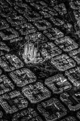 Wall Mural - Aerial view of typical buildings of Barcelona cityscape from helicopter with Sagrada Familia. in black and white. fine art