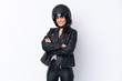 © luismolinero - Young brunette woman with a motorcycle helmet over isolated white background