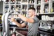 © FotoAndalucia - Young bar-man serving beer glass