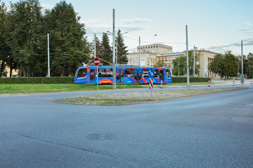 City Daugavpils, Latvia. Train and passengers on street.Travel photo.