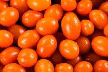 Close-up Of Fresh Cherry Tomatoes As A Background