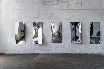 curved mirrors of house of mirrors