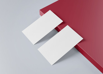 Wall Mural - Two white US business card Mockup laying on red and grey background 3D rendering