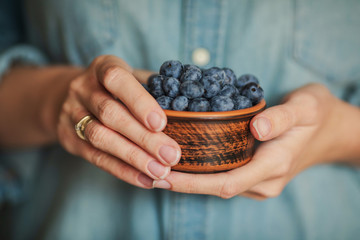 Wall Mural - fresh blueberries in a plate with a slide