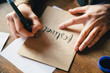 © Andrey Pavlov/Stocksy - Anonymous practicing calligraphy