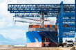 © Sky-Blue Images/Stocksy - Stacked cargo containers in storage area of freight sea port terminal