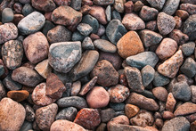 Texture With Multicolored Stones On Rocky Beach