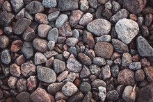 Texture With Multicolored Stones On Rocky Beach