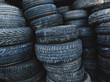 © Sky-Blue Images/Stocksy - Used tyres in a pile