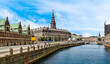 A view along the Slotsholmen islet towards the parliament building in Copenhagen, Denmark in the summertime