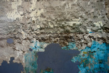 Abstract Concrete Wall With Remnants Of Old Blue And Gray Paint (grunge Effect)