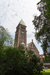 Gothenburg, Sweden - June 18 2019: the view of Vasa Church seeing from trees on June 18 2019 in Gothenburg, Sweden.