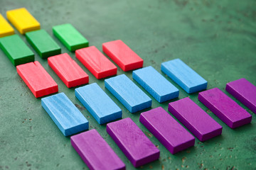 wooden blocks on color background