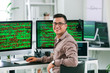 © Pixel-Shot - Portrait of male programmer in office