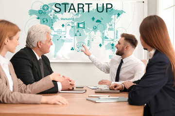 Canvas Print - Business trainer giving lecture in conference room