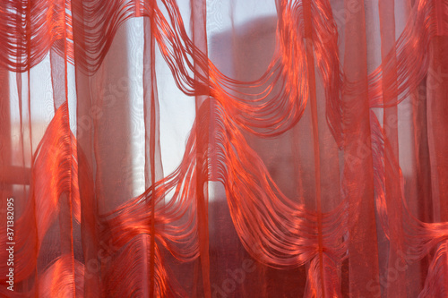Cuadros en Lienzo A picture of a curtain with a red light filter