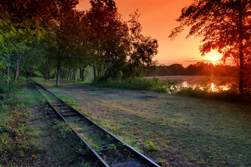 Sticker - Old railway tracks along a lake in the French Gatinais regional nature park