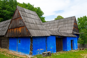 Wall Mural - authentic and traditional house made of clay and thatched roof and wood