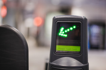 Touch your ticket and go. Subway entrance gate