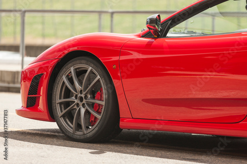 Fotografía A red luxury sports car at outdoors