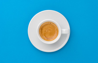 Wall Mural - espresso coffee on blue background