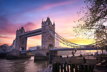 Wall Mural - Sunset over Tower Bridge crossing the River Thames in London, UK.