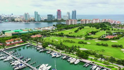 Wall Mural - Aerial shot Miami Beach South Florida island scene with yachts