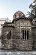 Small Byzantine style church in center of Athens known as Kapnikarea (around 1050) dedicated to Assumption of Virgin Mary, located at busy Ermou Street. Athens. Greece.