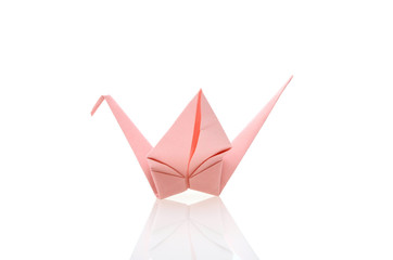 Wall Mural - origami pink bird paper on white background