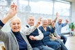 © Westend61 - Senior citizens participating in group event in retirement home