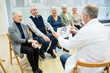 © Westend61 - Group of seniors attending health counselling in retirement home