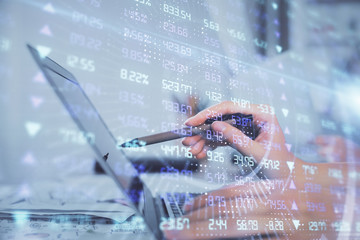 Fototapete - Multi exposure of woman hands typing on computer and financial graph hologram drawing. Stock market analysis concept.