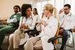 © Mediteraneo - Group of doctors and therapists in a seminar on medical education