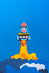 Wall Mural - Rocket takes off paper craft. Back to school. Copy space. Business concept
