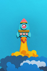 Wall Mural - Rocket takes off paper craft. Back to school. Copy space. Business concept