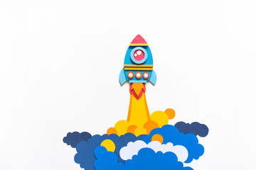 Wall Mural - Rocket takes off paper craft. Back to school. Copy space. Business concept