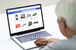 © Andrey Popov - Senior Man Shopping Consumer Gadgets Online