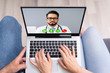 © Andrey Popov - Pregnant Couple In Online Video Conference Call