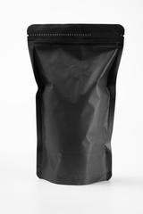 Wall Mural - blank black standing pouch container over white background. product mockup