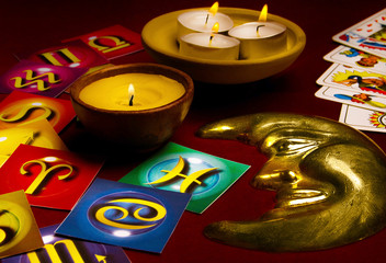 lunar astrology with zodiac signs cards, candels and tarot cards like astrological and esoteric concept 