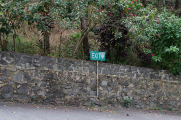 Exit Way sign inside Zoo with forest situation