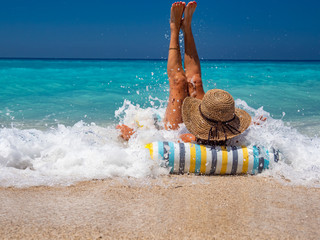 Wall Mural - Woman at the beach in Greece