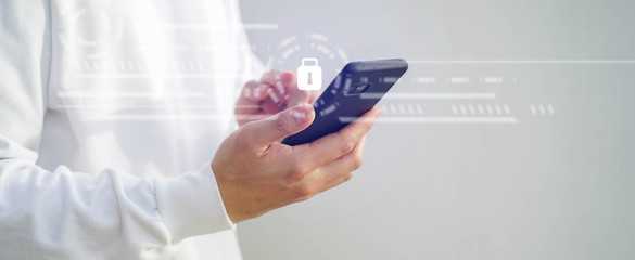 Wall Mural - close up programmer man hand hold smartphone to register data system or access password with virtual