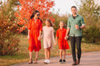 © travnikovstudio - Portrait of happy family of four in autumn day