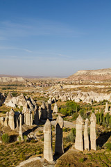 Wall Mural - Volcanic rock formations known as Fairy Chimneys in the Valley of Love, Cappadocia, Turkey